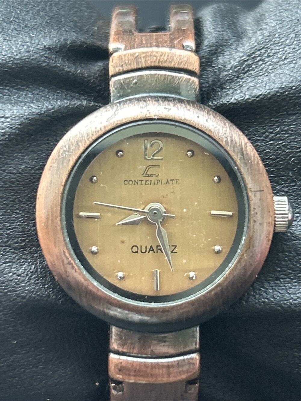Contemplate Brown Dial Bronze Tone Case And Band Women’s Cuff Watch